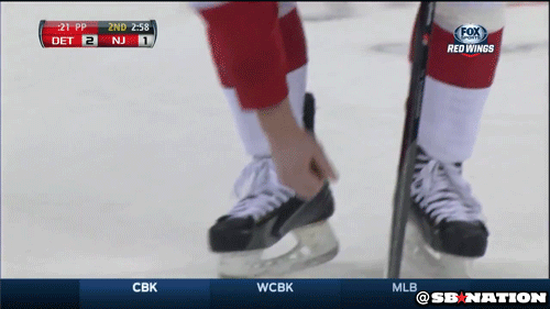 Hockey player gets hit, picks up own teeth off the ice, keeps playing
