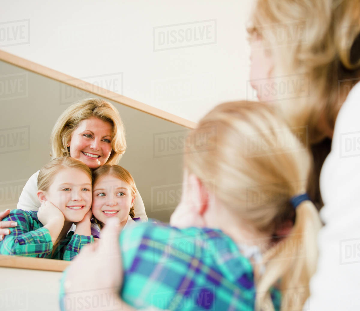 USA, Jersey City, New Jersey, mother and daughters (811) looking into
