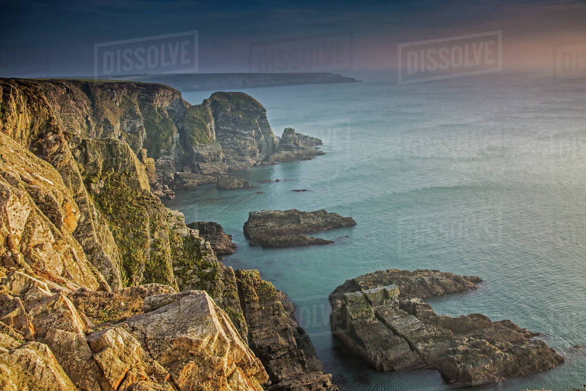 Craggy cliffs overlooking ocean, South Stack cliffs, Anglesey, Wales