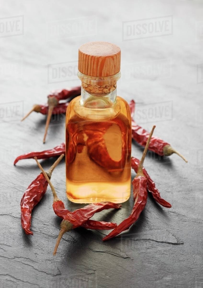 Chilli oil Stock Photo Dissolve