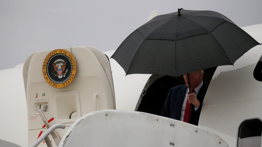 Trump v brolly US president mocked online for dumping open umbrella