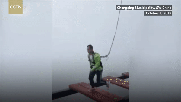 Chilling VIDEO shows tourist’s safety cord snapping during jump across