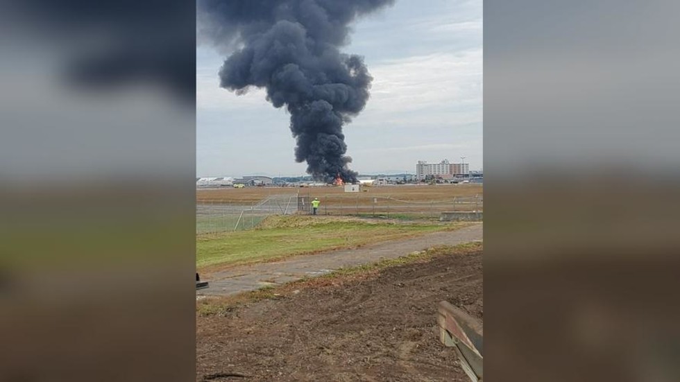 7 killed after WWIIera plane crashes at Connecticut airport, sparking