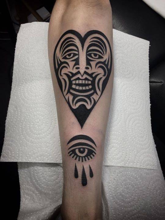 Heart Face And Eye Tattoo On Pewdiepie's Forearm. 720_x_540_jpg
