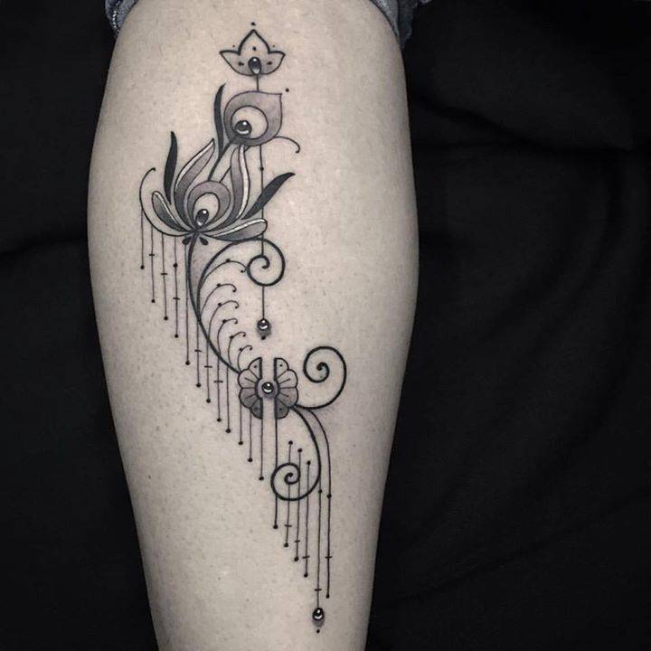 Ornamental Tattoo On The Left Calf. 720_x_720_jpg