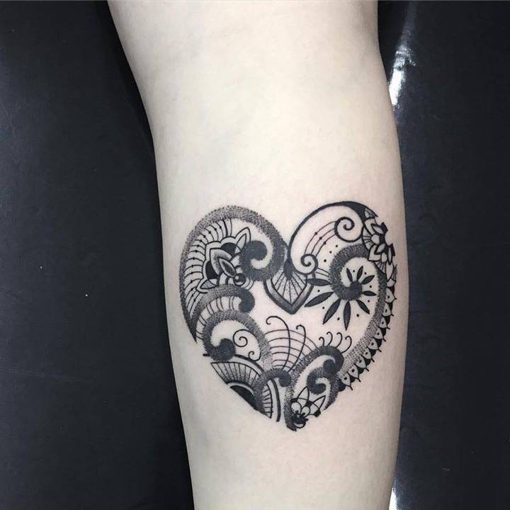 Henna inspired heart tattoo.