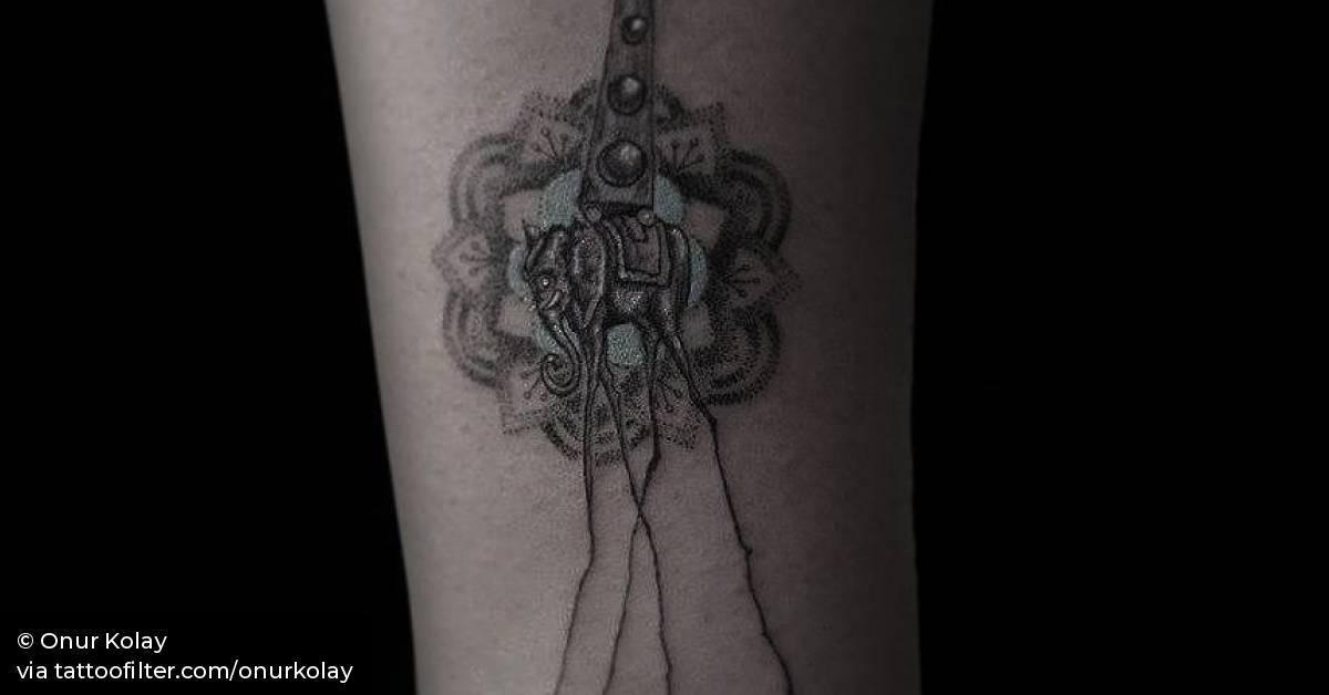 Salvador Dali Inspired Elephant Tattoo