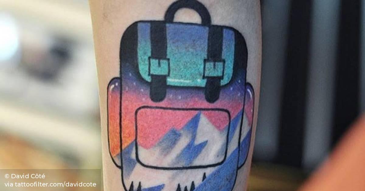Double exposure backpack tattoo on the right inner arm.