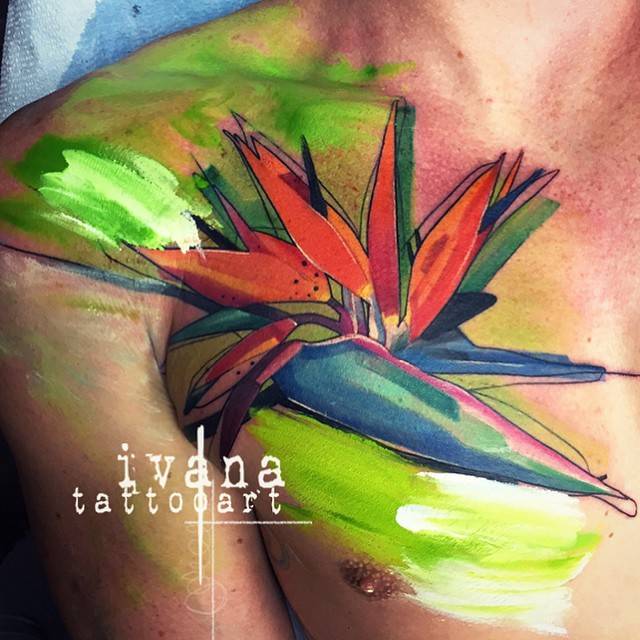 Acrylic style tattoo of the bird of paradise flower on