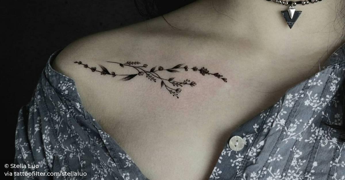 Small flower on the collarbone.