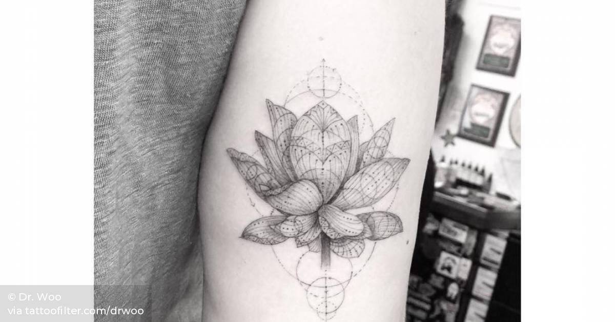 Single Needle Lotus Flower Tattoo On The Back Of The 628_x_1200_jpg