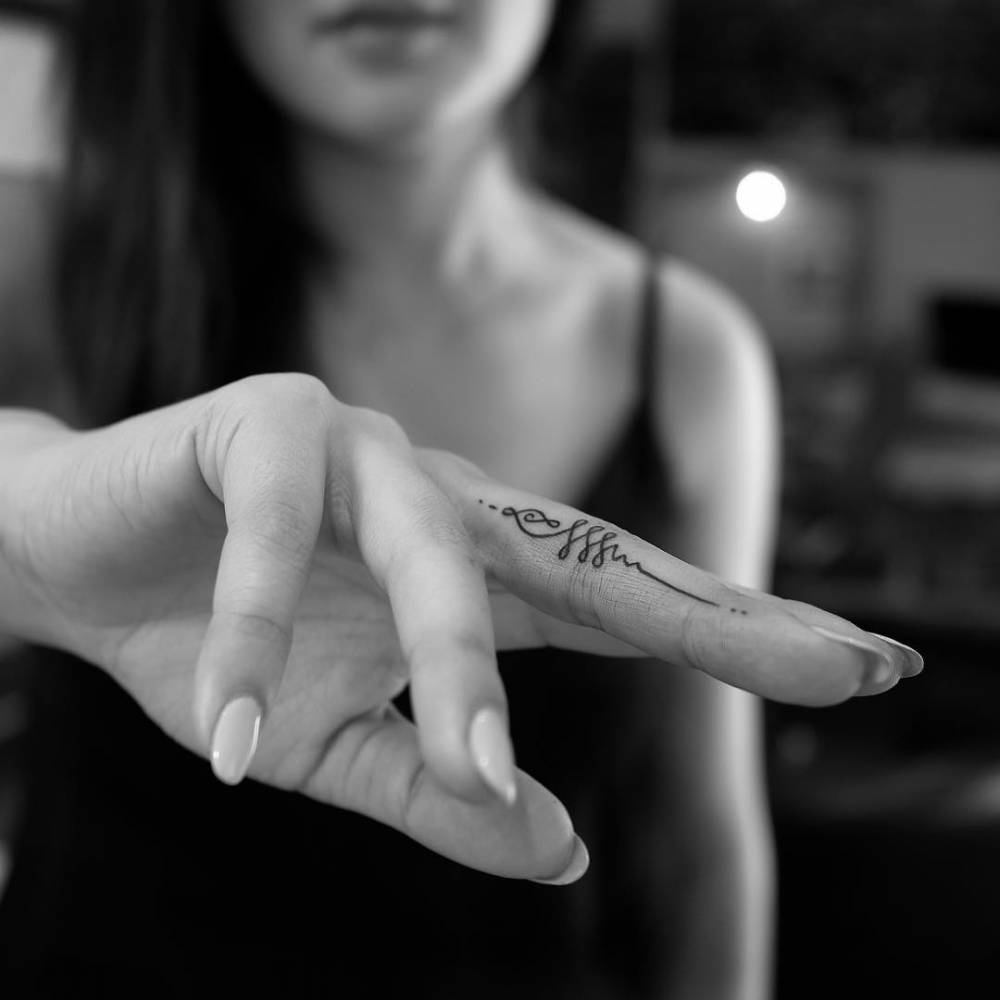 Unalome Tattoo On The Finger