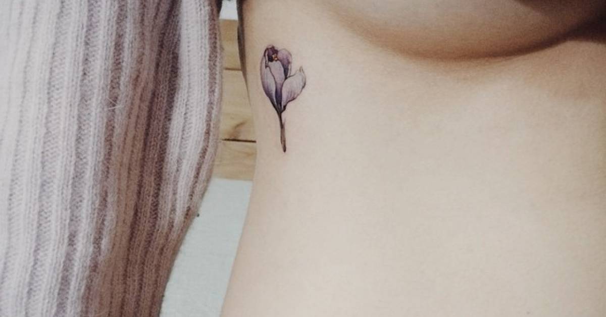 Side tattoo of a saffron crocus.