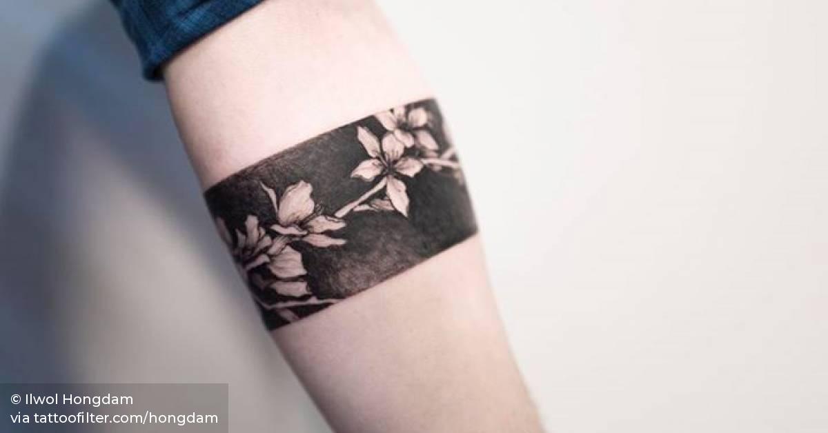 Cherry blossom armband tattoo.
