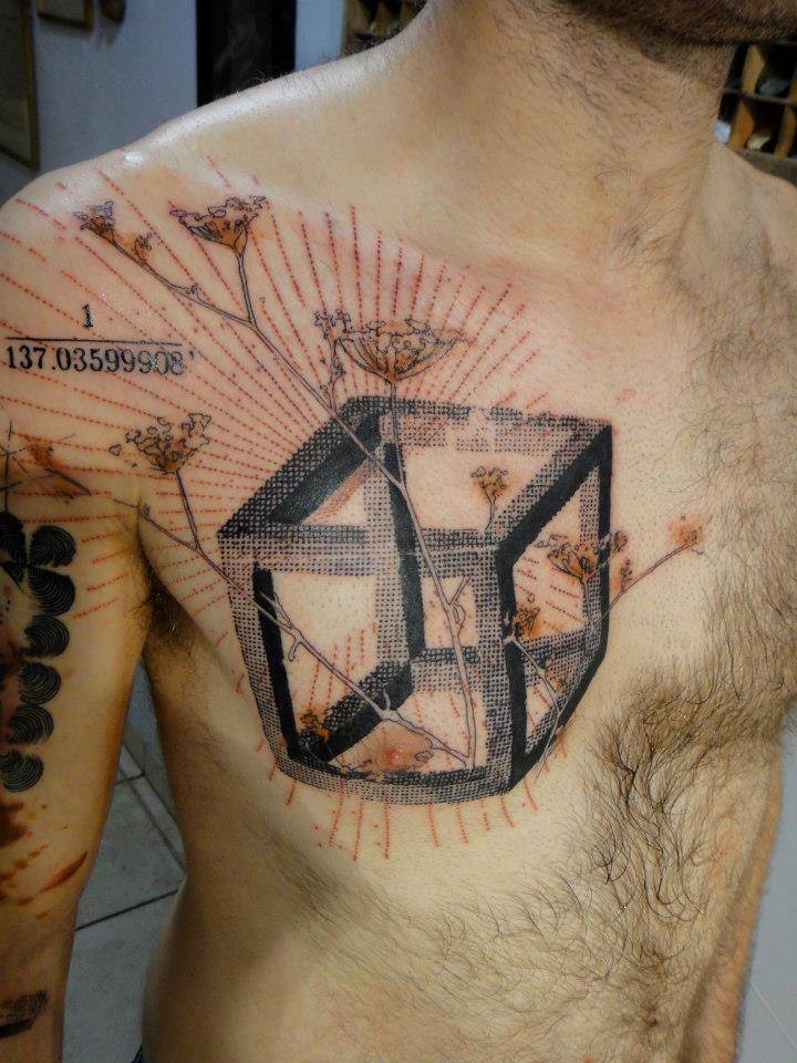 Graphic style impossible object tattoo on chest and