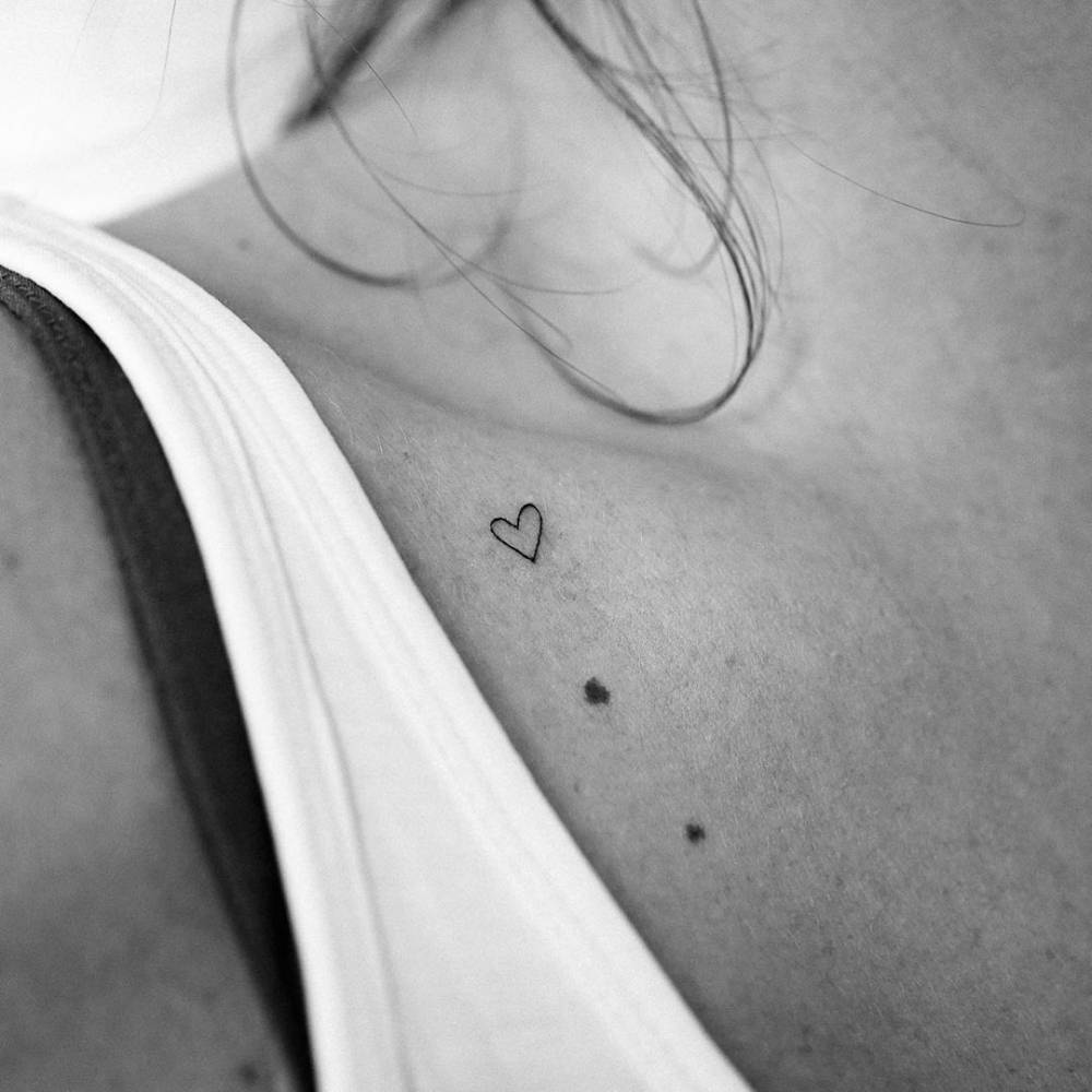 Minimalist heart tattoo