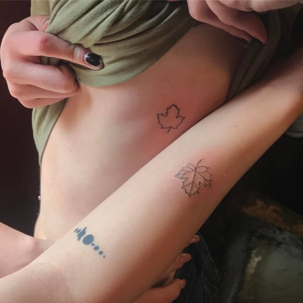 Friendship maple leaves tattoos on Bea Miller and her