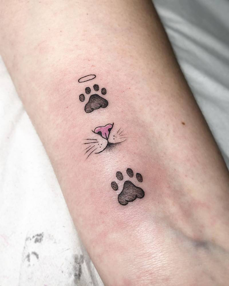 Cat whiskers and paws tattoo