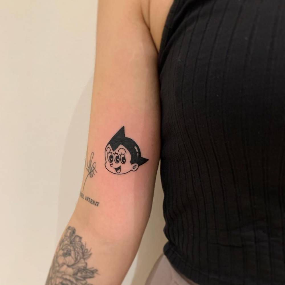3 Eyed Astroboy Tattooed on Inner Arm