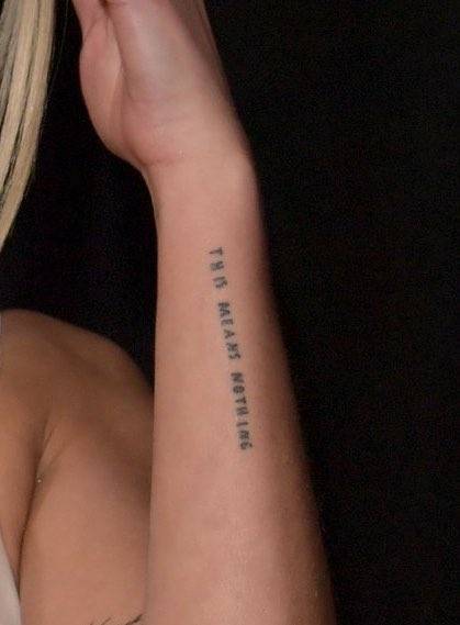 This Means Nothing" - Dua Lipa's Lettering Tattoo 569_x_419_jpg