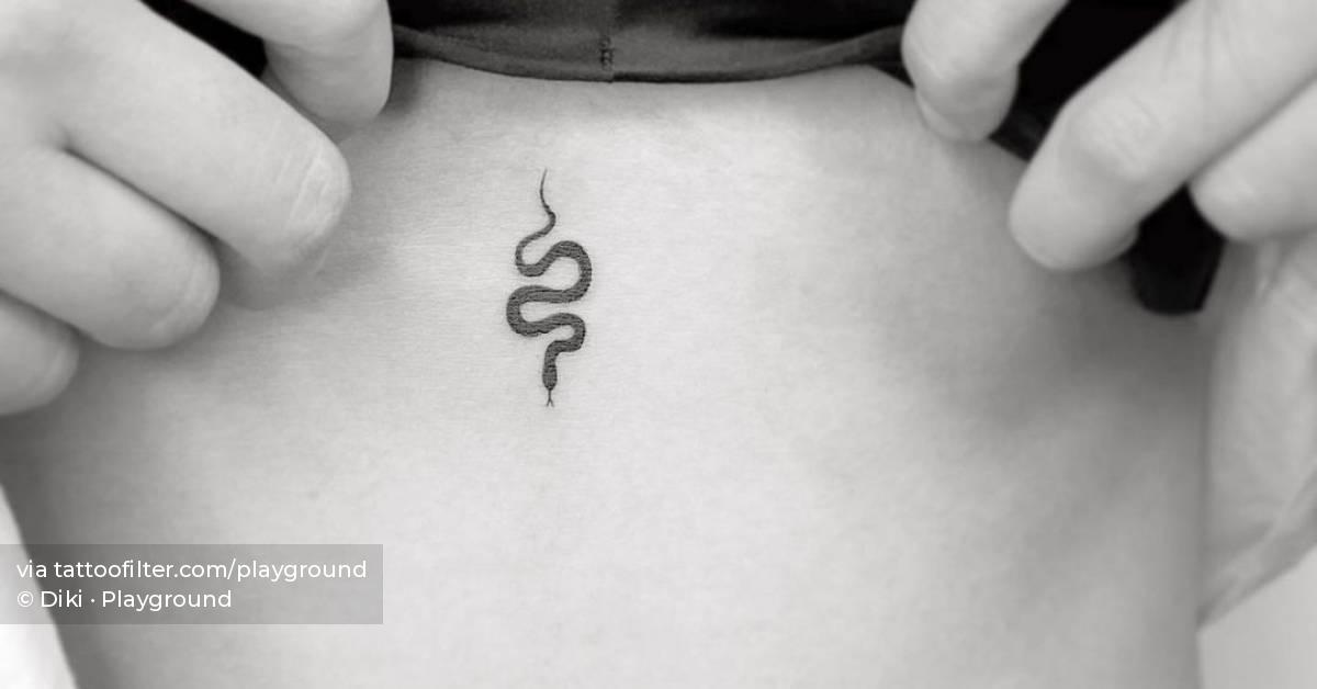 Minimalist Snake Tattoo On The Stomach 628_x_1200_jpg