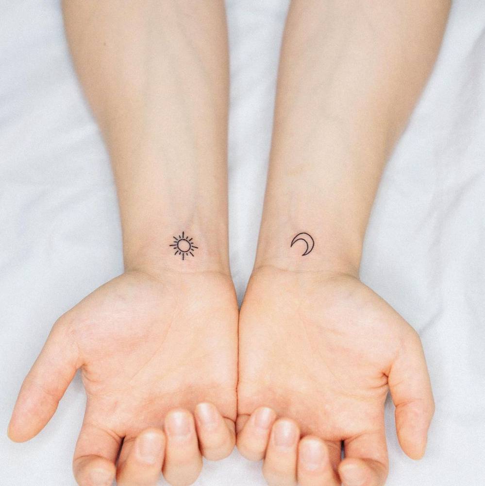Minimalist Matching Sun And Moon Tattoo On The Wrist 1000_x_999_jpg