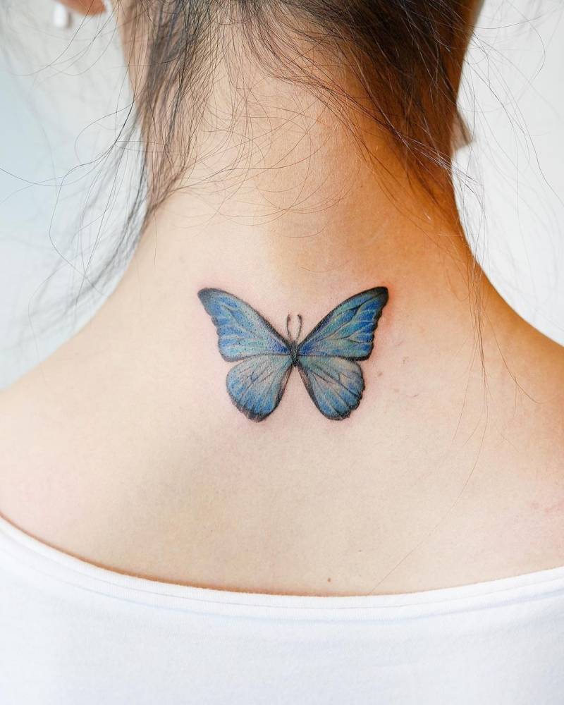 Microrealistic butterfly tattoo