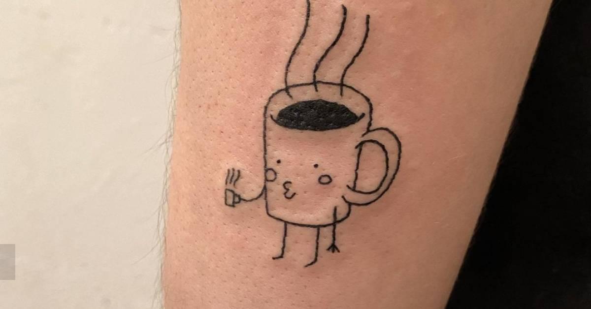 Coffee cup tattoo on the forearm.