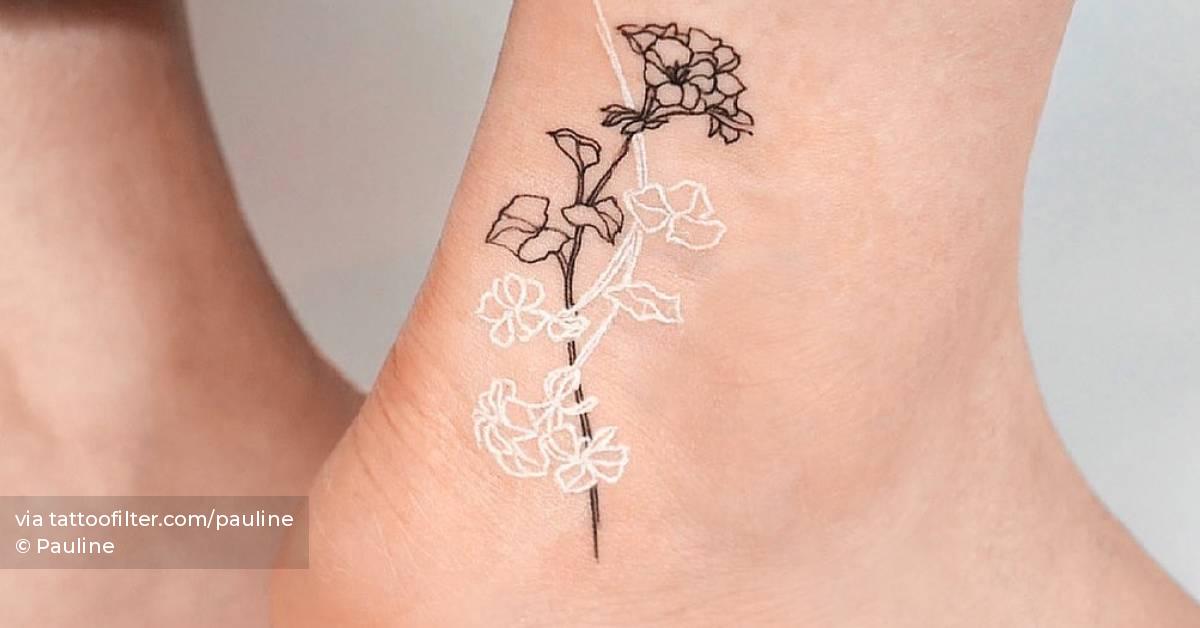 Fine line geranium tattoo on the ankle.