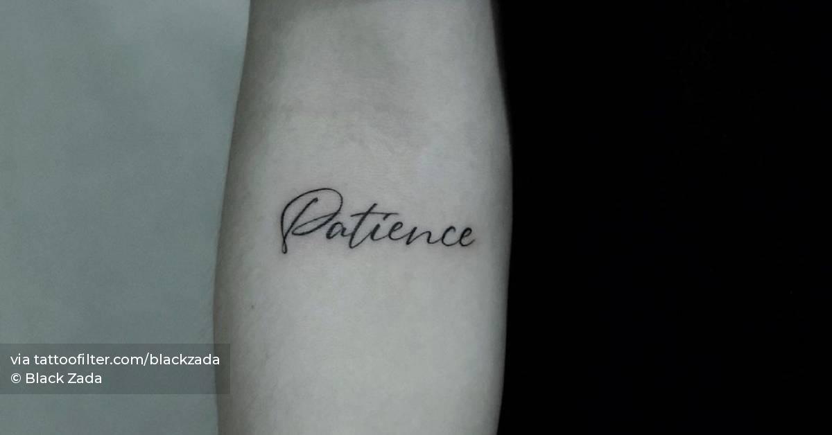 "Patience" lettering tattoo on the inner forearm.