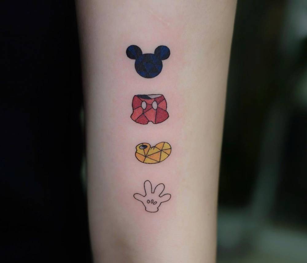 Mickey Mouse Tattoo On The Tricep. 857_x_1000_jpg
