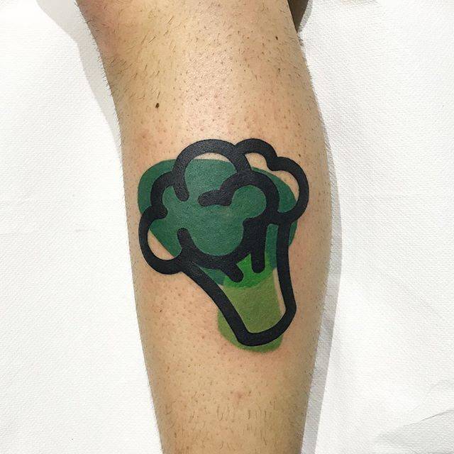 Broccoli tattoo on the calf.