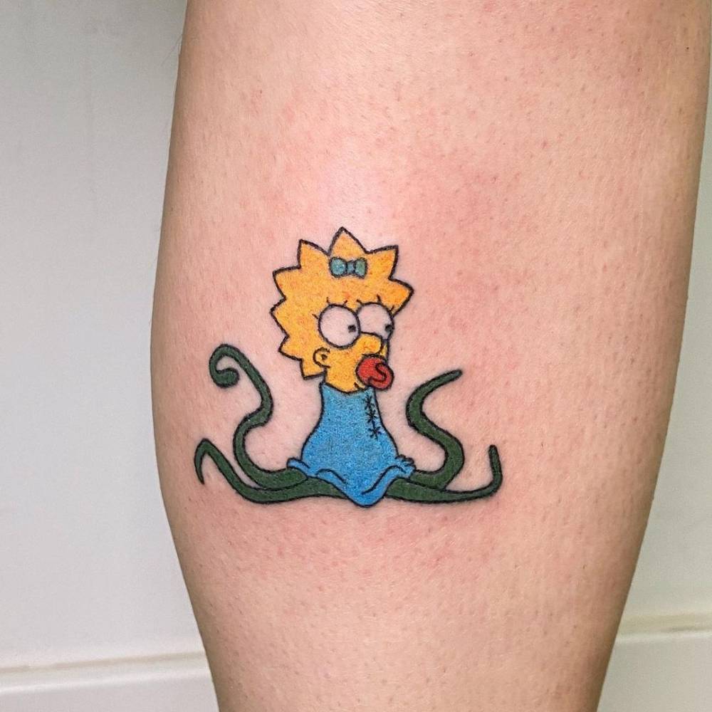 Hand Poked Maggie Simpson Tattoo On The Calf. 1000_x_1000_jpg