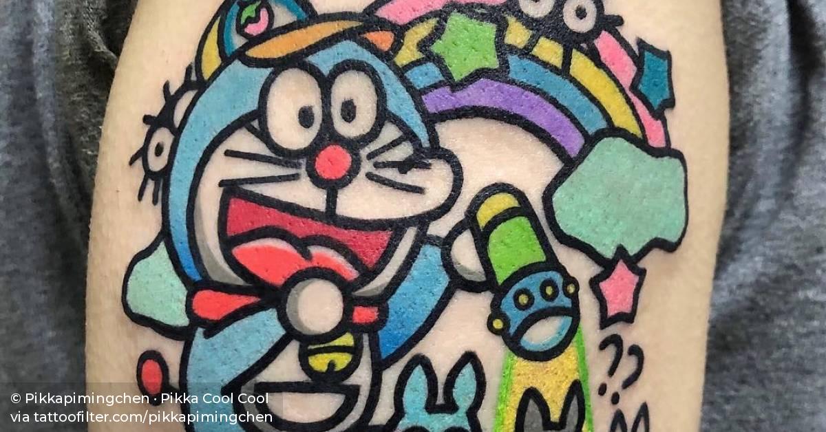 Doraemon tattoo on the upper arm.