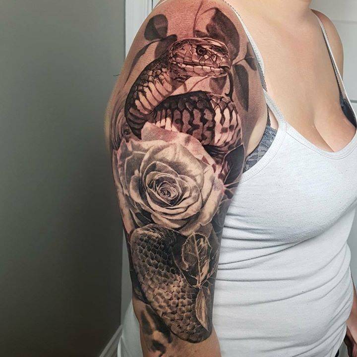 Half Healed Snake And Rose Tattoo On The Right Upper 720_x_720_jpg