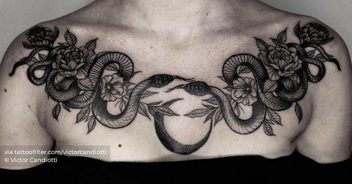 Blackwork snakes and peonie tattoo on the chest.