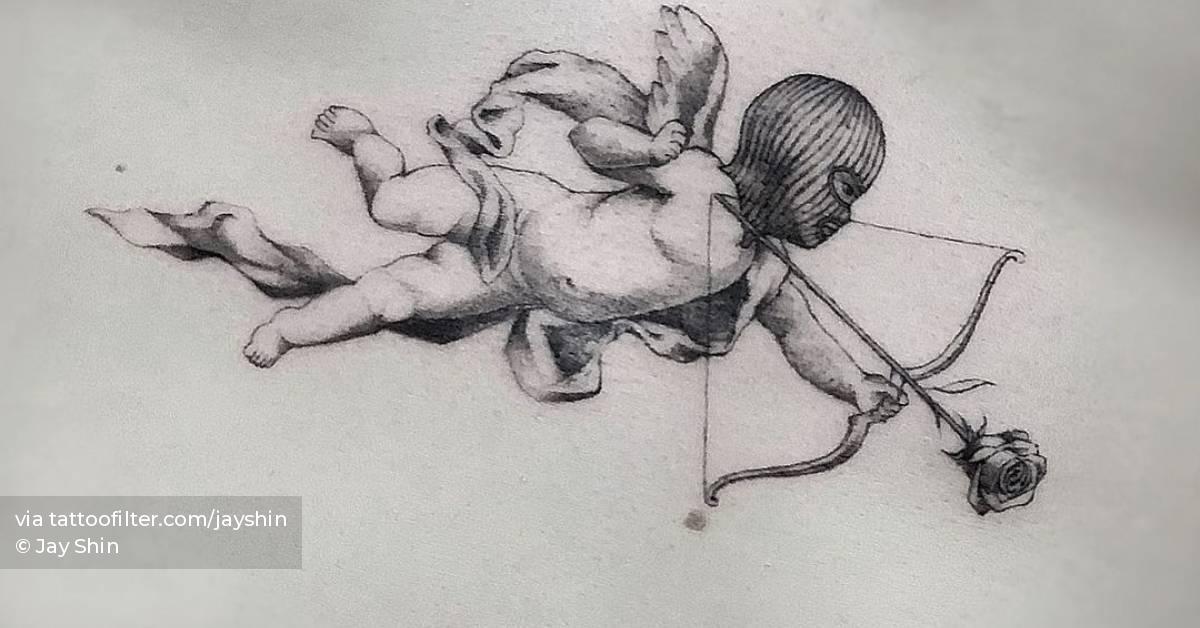 Micro-Realistic Ski Mask Cupid Tattoo On The Sternum. 628_x_1200_jpg