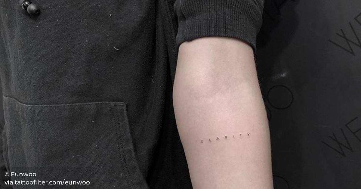 “Clarity” tattoo on the left inner forearm.