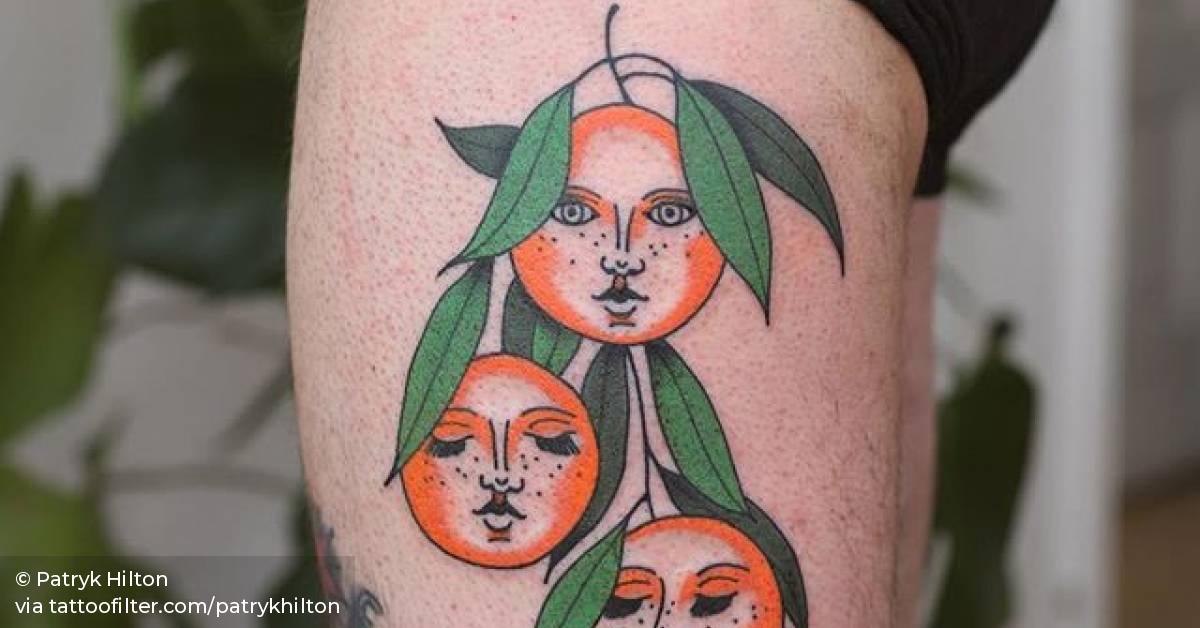 Tangerine gang tattoo on the left thigh.
