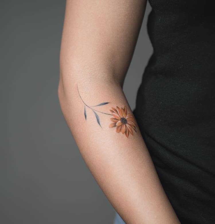 Watercolor Orange Daisy Tattoo On The Right Forearm. 783_x_750_jpg