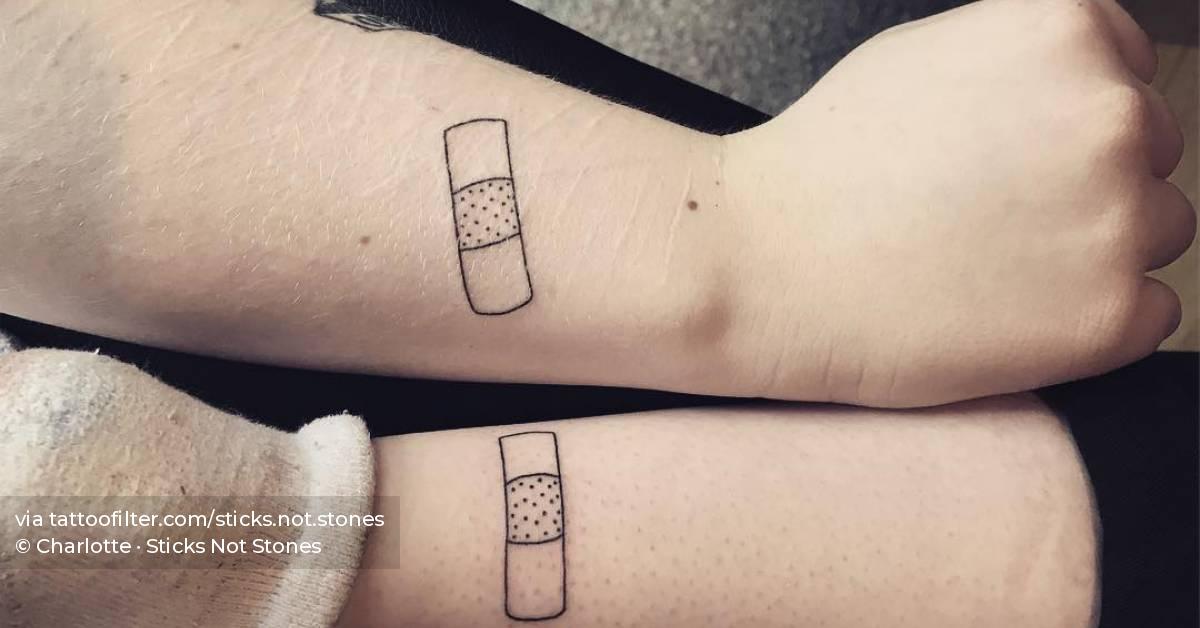 Best friends matching plasters tattoo.