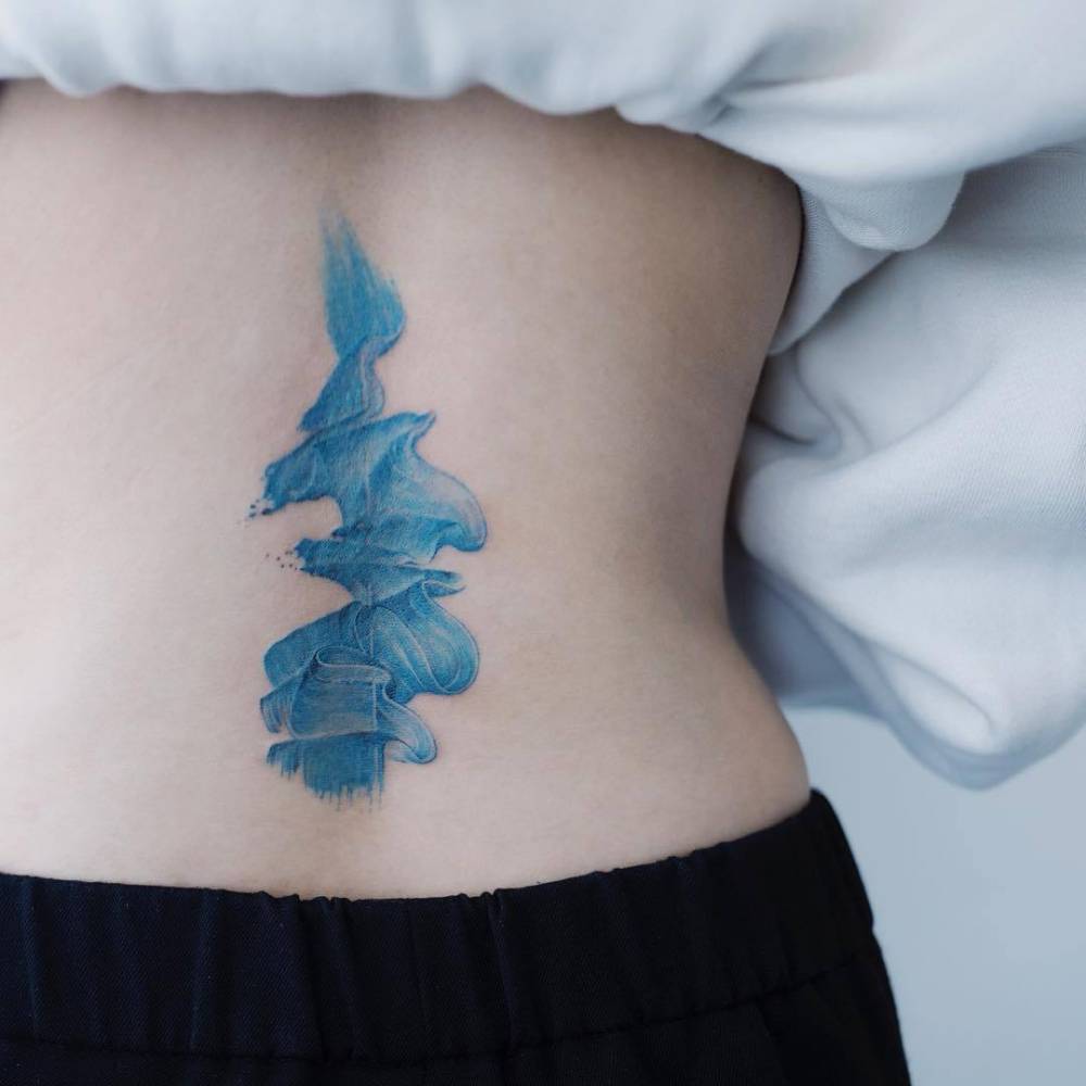 Blue paint tattoo.
