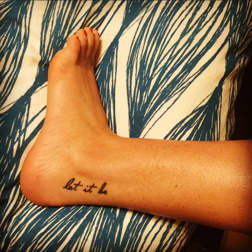 Ankle tattoo saying "Let it be" on Kahrina.