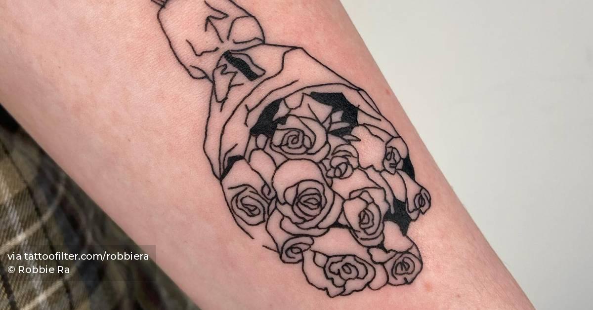 Roses bouquet tattoo done on the inner forearm.