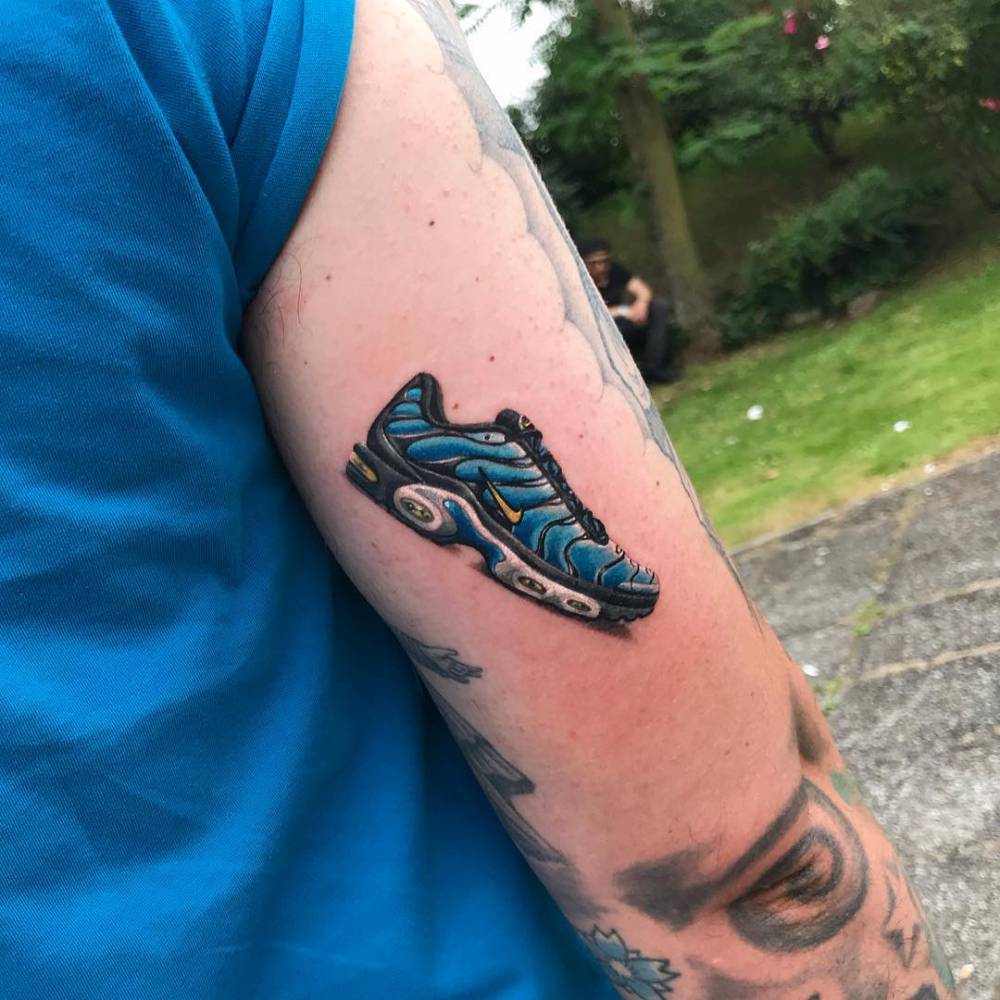 Nike Air Max Plus (1998) tattoo on the back of the