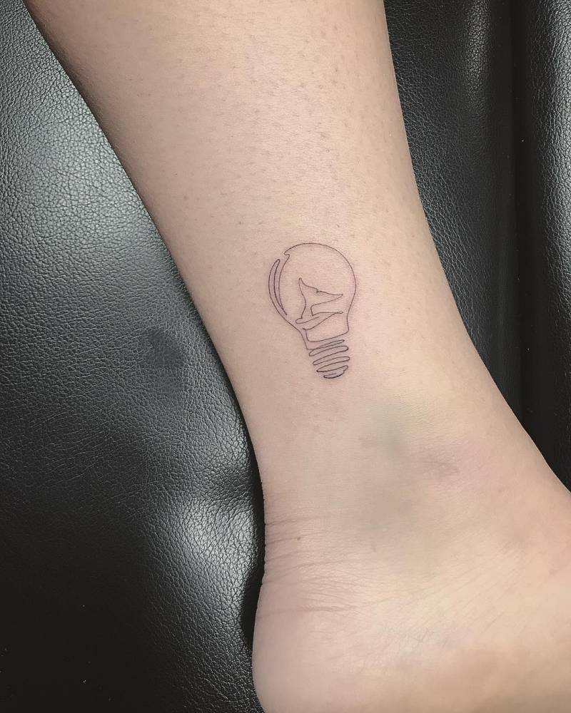 Whale Tail In A Lightbulb Tattoo. 1000_x_800_jpg