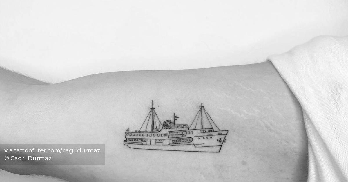 Fine line ship tattoo located on the inner arm.