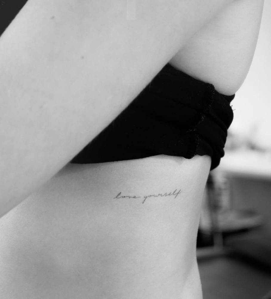 Inspirational Quote Tattoos on the Ribcage