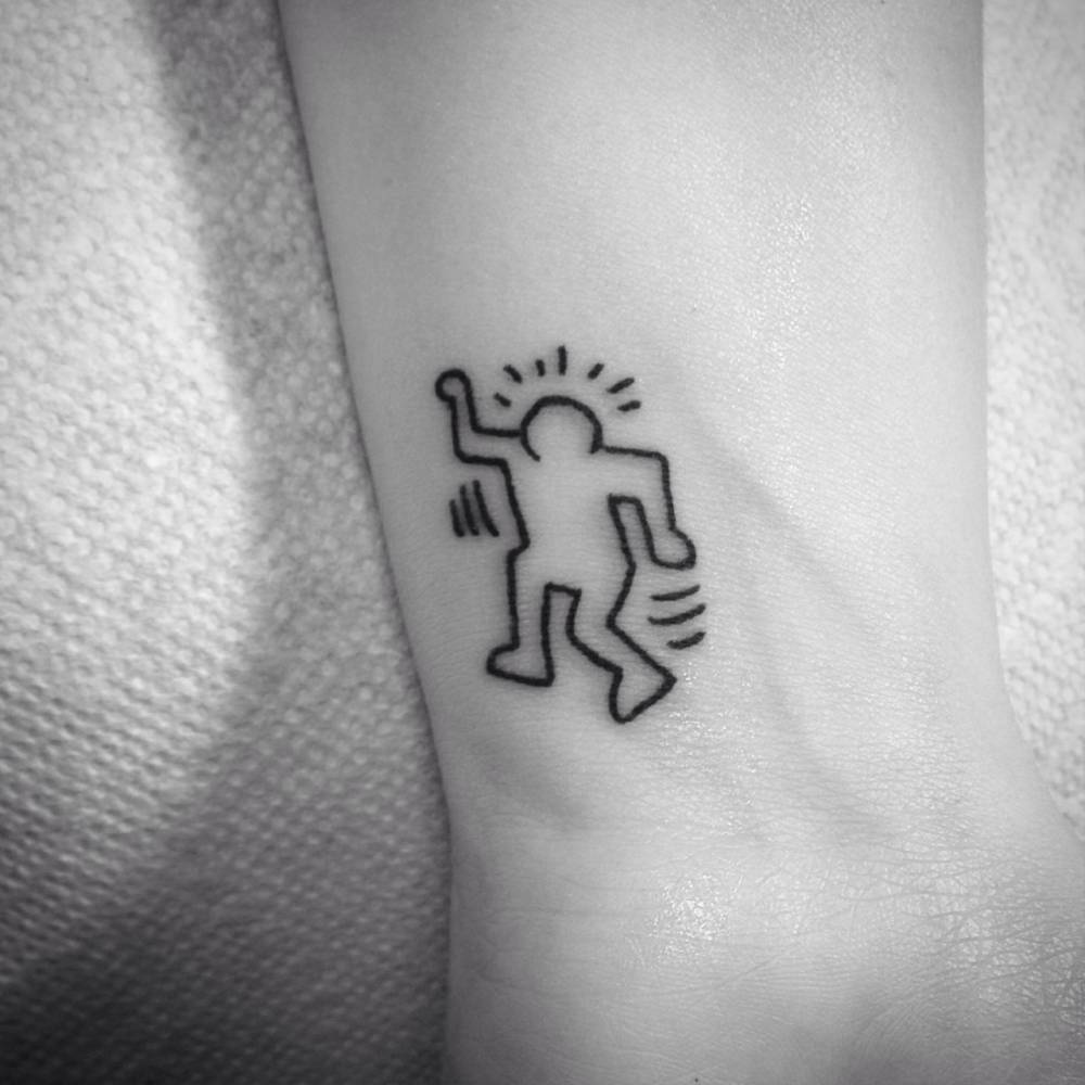 Keith Haring inspired wrist tattoo.