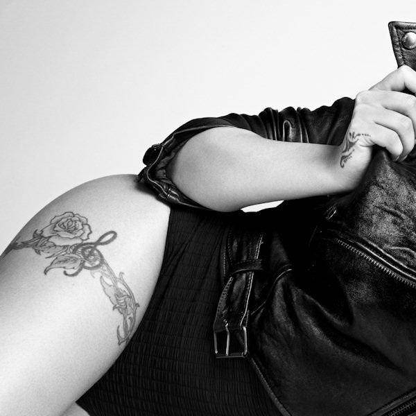 Cheryl Cole's vine and barbed wire tattoo wrapping